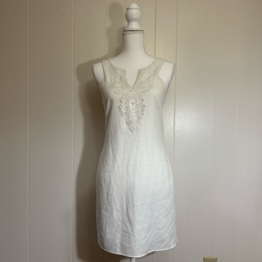 Elegant White Sleeveless Dress with Lace Detail